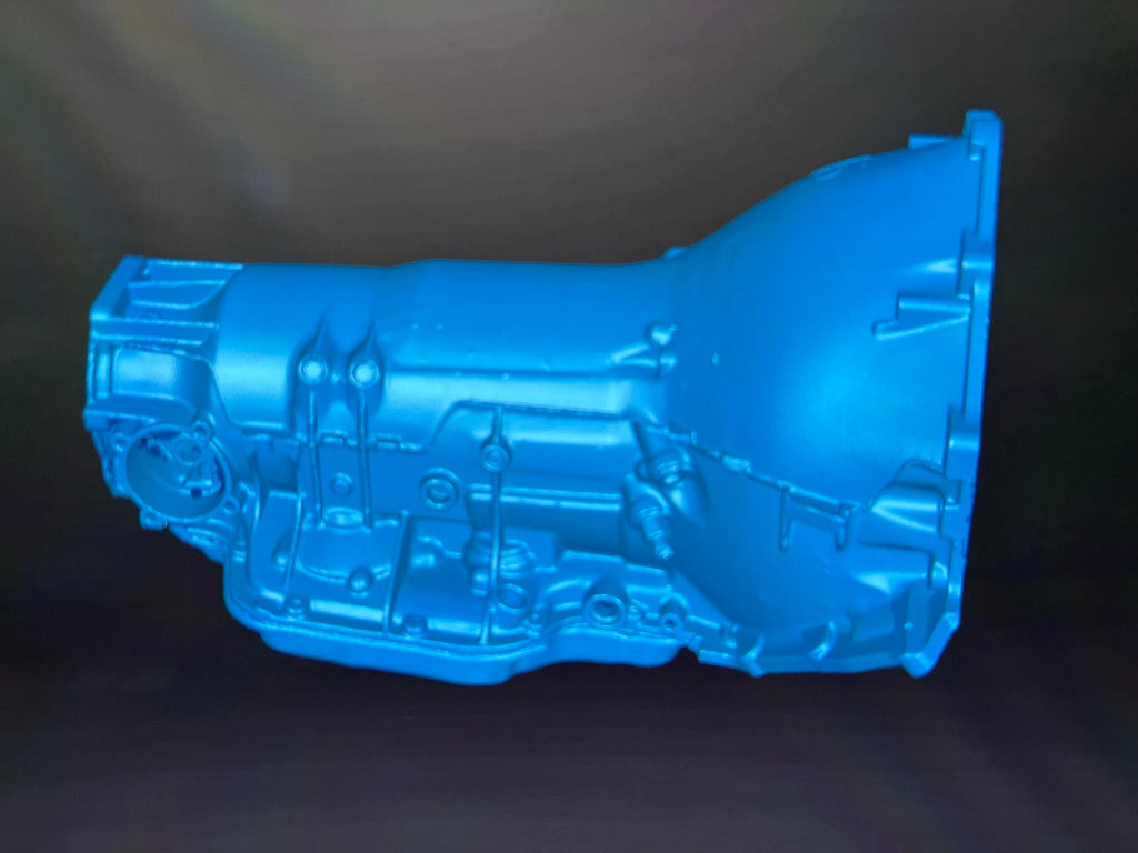 Blue digital 3D scan of a transmission housing