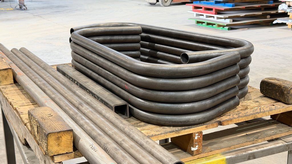 Batch of bent steel tubes produced at KRAZO Laser in Ozark, Alabama